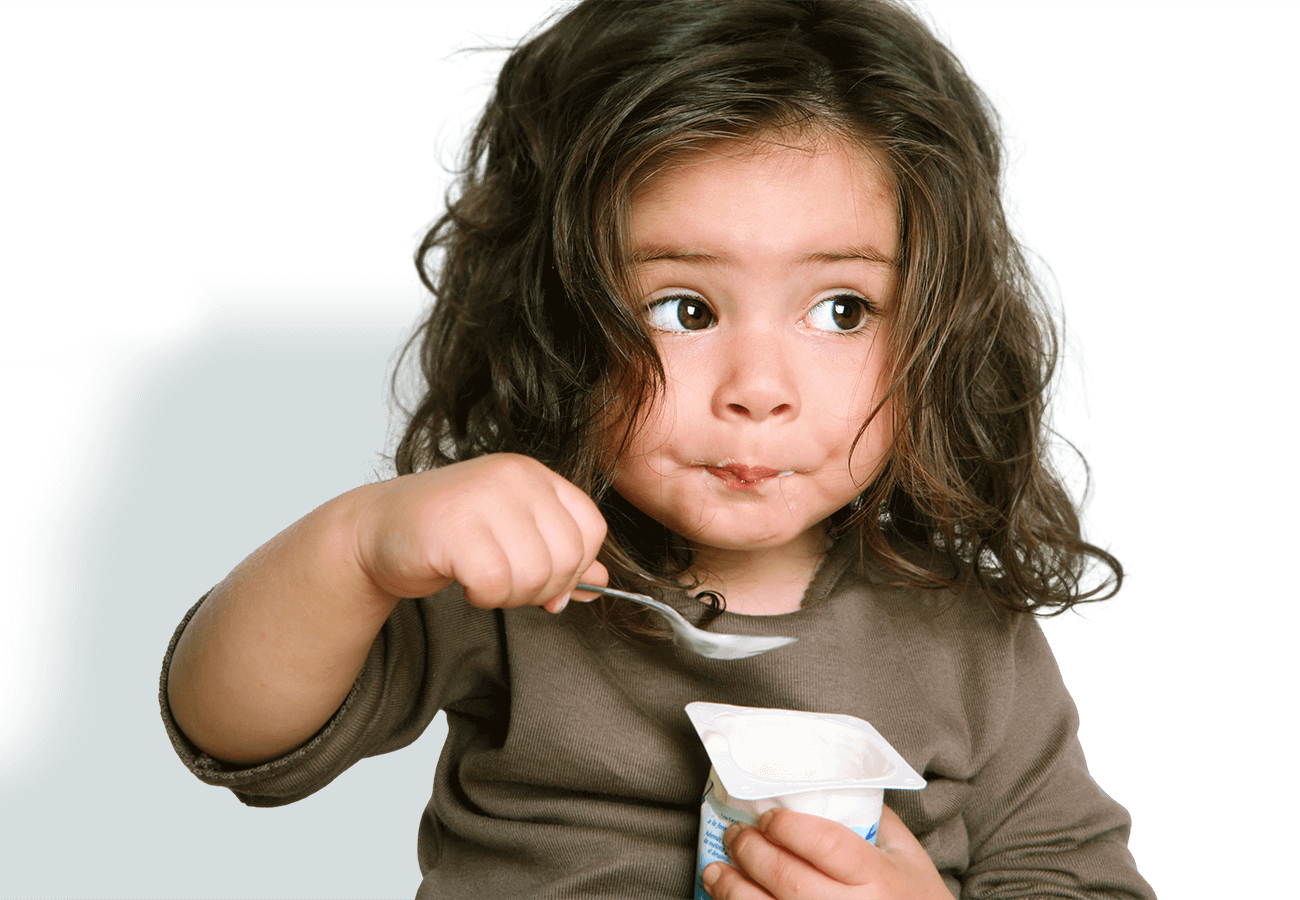 kids klubs gallery page banner photo of girl eating yogurt