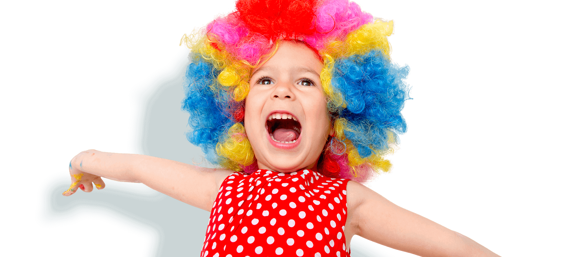 kids klubs gallery page banner photo of girl singing with arms out and wearing a multi-coloured wig