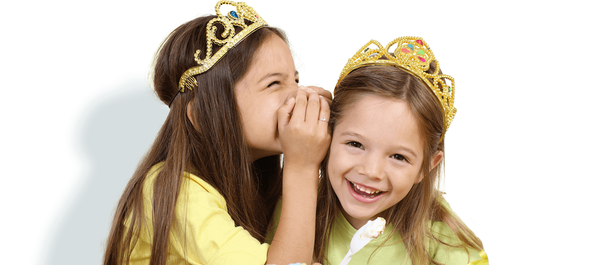 kids klubs gallery page banner photo of two girls dress as princesses, one whispering in the others ear